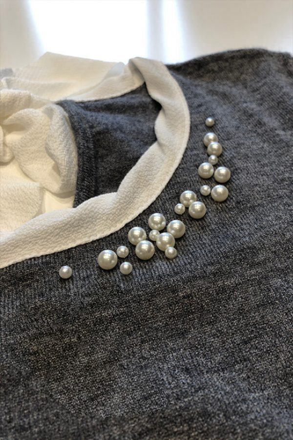 Dettaglio perle del maglione Romeo
